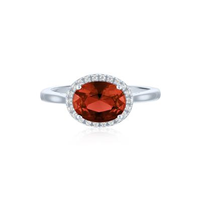 Garnet and Diamond Accent Halo Ring in Sterling Silver