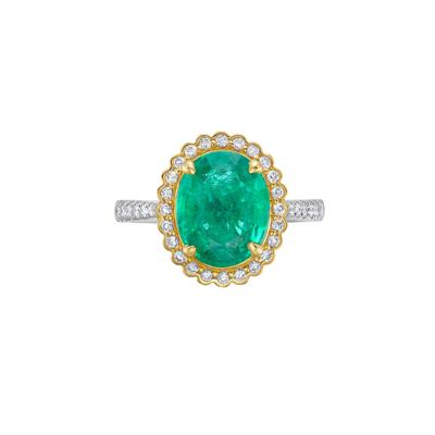 Emerald and Diamond Halo Ring in 14K White and Yellow Gold (3/8 ct. tw.)