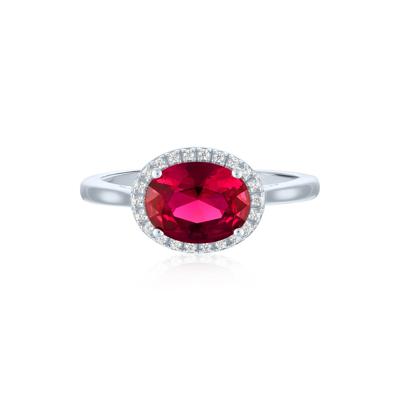Lab-Created Ruby and Diamond Accent Halo Ring in Sterling Silver