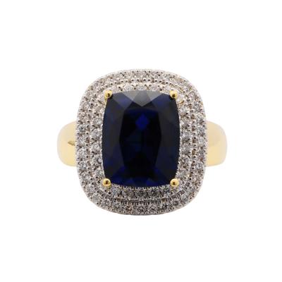 Lab-Created Blue Sapphire and Diamond Ring in 10K Yellow Gold (3/8 ct. tw.)