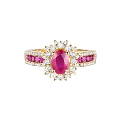 Ruby and Diamond Halo Ring in 14K Yellow Gold (1/2 ct. tw.)