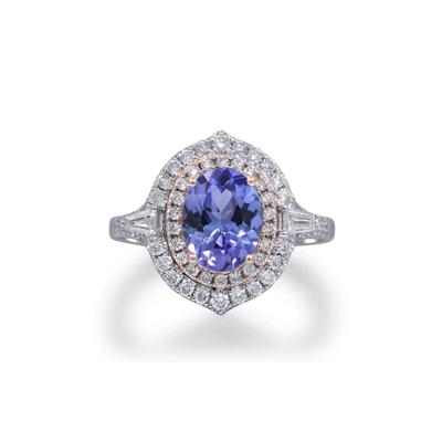 Tanzanite and Diamond Halo Ring in 14K White and Yellow Gold (1/2 ct. tw.)