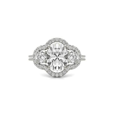 Oval Moissanite Three-Stone Ring with Halo in 14K White Gold