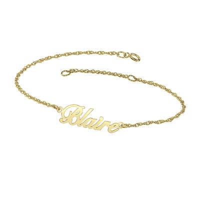 personalized name bracelet with cursive font in 10k yellow gold