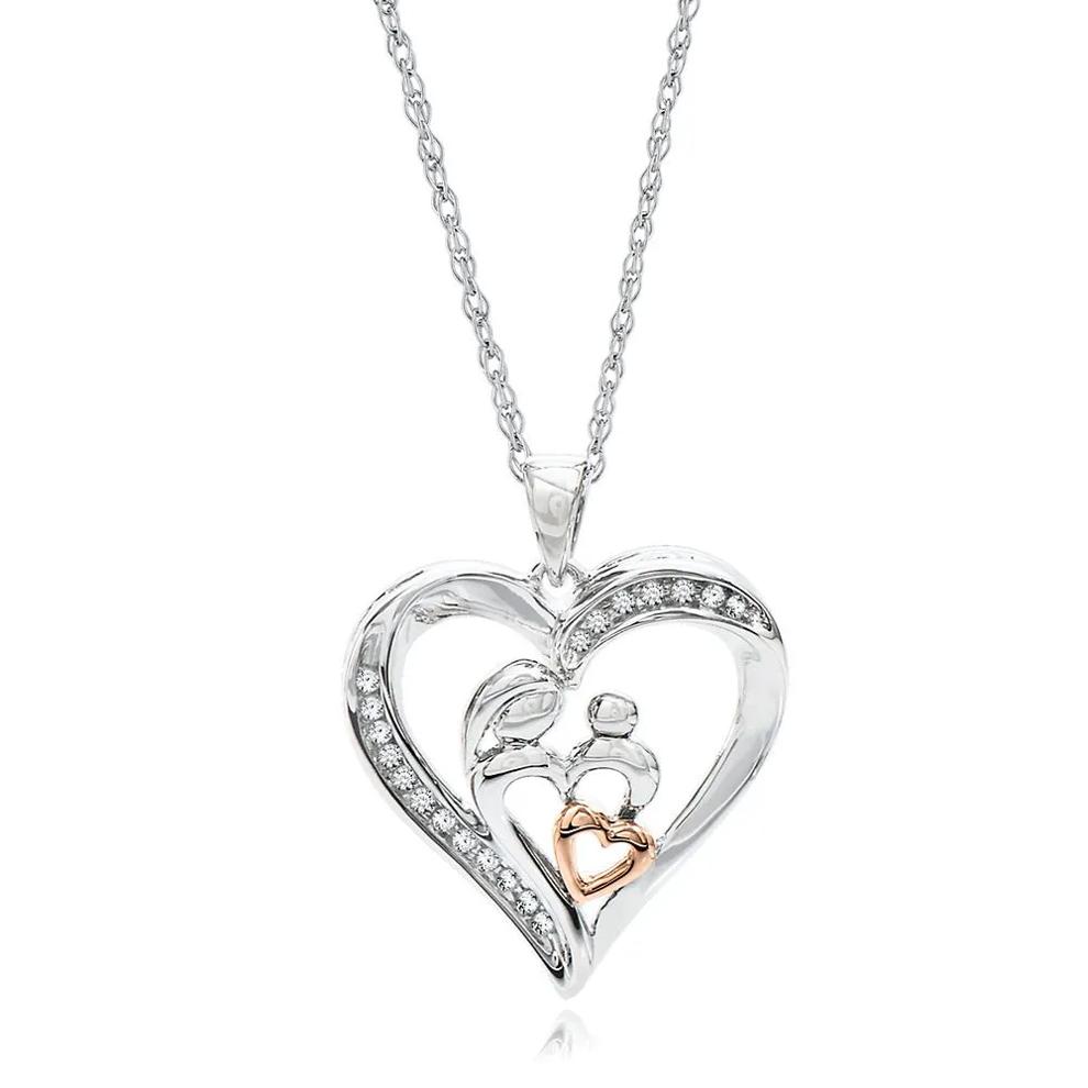 1/10 ct. tw. Diamond Heart Pendant in Sterling Silver &amp; 10K Rose Gold – Image 1 of 2