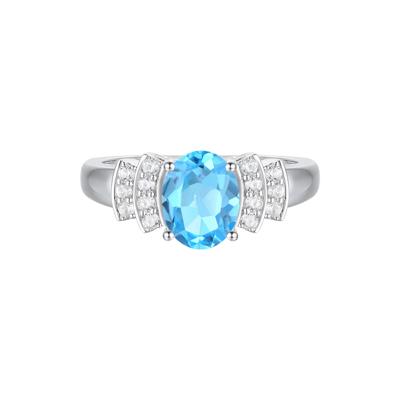 Blue Topaz and Diamond Ring in 10K White Gold (1/5 ct. tw.)