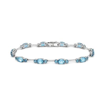 Oval Blue Topaz Line Bracelet in Sterling Silver