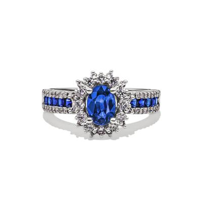 Blue Sapphire & Diamond Halo Ring in 14K White Gold (1/2 ct. tw.)
