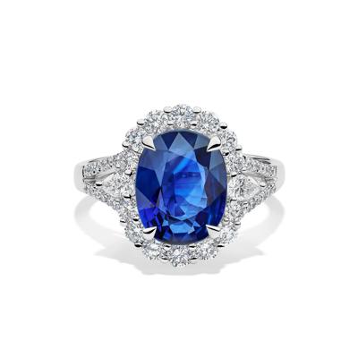 Oval Blue Sapphire & Diamond Halo Band in 18K White Gold (7/8 ct. tw.)