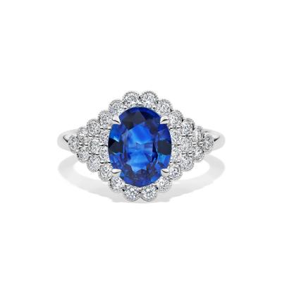 Oval Blue Sapphire & Diamond Halo Band in 18K White Gold (7/8 ct. tw.)
